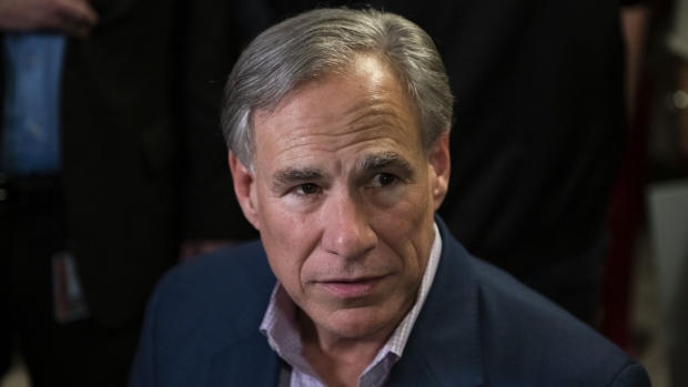 Greg Abbott, governor of Texas, speaks during a Get Out The Vote campaign event in Beaumont, Texas, U.S., on Thursday, Feb. 17, 2022. Abbott has a 10-point lead over Democrat Beto O'Rourke ahead of November's general election, according to a University of Texas and Texas Politics Project poll released Monday.