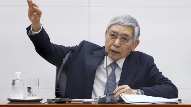Haruhiko Kuroda, governor of the Bank of Japan (BOJ), gestures while speaking during a news conference at the central bank's headquarters in Tokyo, Japan, on Friday, March 18, 2022. Kuroda doubled down on his commitment to continue with stimulus even if inflation continues to accelerate, in a rebuttal of the need to join a global wave of central banks normalizing policy.