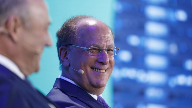 Larry Fink, chairman and chief executive officer of BlackRock Financial Management Inc., smiles during a panel discussion at the Bloomberg New Economy Forum in Singapore, on Wednesday, Nov. 7, 2018. The New Economy Forum, organized by Bloomberg Media Group, a division of Bloomberg LP, aims to bring together leaders from public and private sectors to find solutions to the world's greatest challenges. Photographer: Justin Chin/Bloomberg