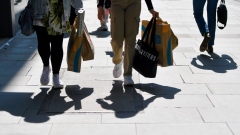 Shoppers carry bags from Primark and Urban Outfitters in Manchester, U.K., on Thursday, April 21, 2022. The Office for National Statistics are due to release the latest U.K. retail sales figures on Friday. Photographer: Anthony Devlin/Bloomberg