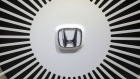 A Honda Motor Co. logo sits in the wheel on a Urban EV concept automobile on day two of the 88th Geneva International Motor Show in Geneva, Switzerland, on Wednesday, March 7, 2018. The show opens to the public on March 8, and will showcase the latest models from the world's top automakers. Photographer: Chris Ratcliffe/Bloomberg