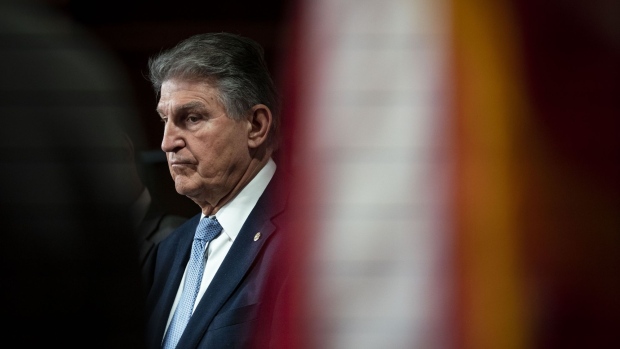 Senator Joe Manchin, a Democrat from West Virginia, listens during a news conference about a bill to ban Russian energy imports, at the U.S. Capitol in Washington, D.C., U.S., on Thursday, March 3, 2022. The White House is asking Congress for $32.5 billion in emergency funding to boost its response to Russia's invasion of Ukraine and tackle the ongoing fight against the coronavirus. Photographer: Al Drago/Bloomberg