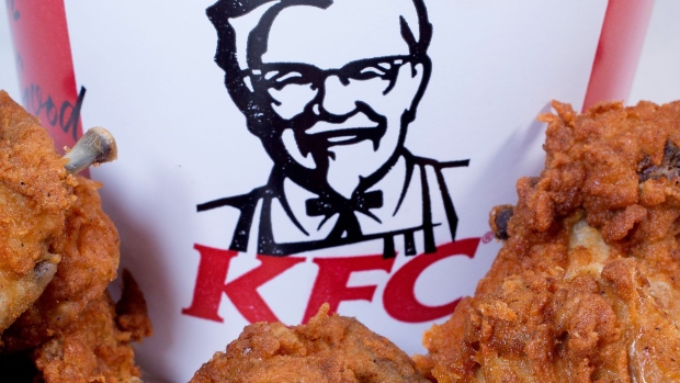 BRISTOL, ENGLAND - FEBRUARY 20: In this photo illustration the KFC logo is pictured besides a selection of chicken pieces on February 20, 2018 in Bristol, England. KFC has been forced to close hundred of its outlets as a shortage of chicken, due to a failure at the company's new delivery firm DHL, has disrupted the fast-food giant's UK operation and is thought to be costing the fast food chain £1million a day. (Photo by Matt Cardy/Getty Images) Photographer: Matt Cardy/Getty Images Europe