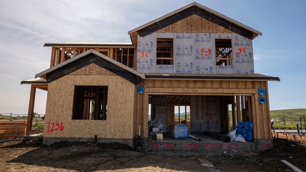 A house under construction in the Cielo at Sand Creek by Century Communities housing development in Antioch, California, U.S., on Thursday, March 31, 2022. U.S. home prices shows signs of becoming “unhinged from fundamentals” like they did in the housing bubble that preceded the 2008 crash, according to a blog post by the Dallas Federal Reserve bank.