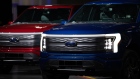 2022 Ford F-150 Lightning all-electric trucks during a launch event at the Rouge Electric Vehicle Center in Dearborn, Michigan, U.S., on Tuesday, April 26, 2022. Ford has 200,000 reservations for the F-150 Lightning and is expanding the Rouge Electric Vehicle Center to ramp up production to a planned annual run rate of 150,000 in 2023.