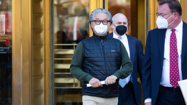 Bill Hwang, chief executive officer and founder of Archegos Capital Management LP, left, departs federal court in New York, U.S., on Wednesday, April 27, 2022. 