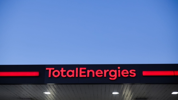 Signage for TotalEnergies SE at a gas station in Toulouse, France, on Thursday, Feb. 10, 2022. TotalEnergies promised to increase its dividend and buy back more shares after posting a record fourth-quarter profit. Photographer: Matthieu Rondel/Bloomberg