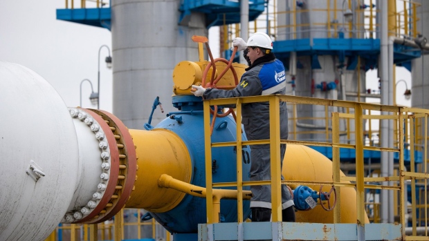 A worker turns a valve wheel at the Kasimovskoye underground gas storage facility, operated by Gazprom PJSC, in Kasimov, Russia, on Wednesday, Nov. 17, 2021. Russia signaled it has little appetite for increasing the natural gas it transits through other territories to Europe as the winter heating season gets underway.