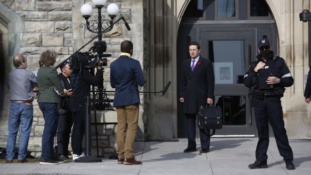 Pierre Poilievre, a member of Parliament, speaks to members of the media outside of West Block on Parliament Hill in Ottawa, Ontario, Canada, on Friday, Nov. 6, 2020. Prime Minister Justin Trudeau said he won't weigh in on the 2020 U.S. Presidential election until the outcome becomes "sufficiently clear," CBC News reported. Photographer: David Kawai/Bloomberg