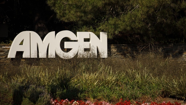 Signage is displayed outside Amgen Inc. headquarters in Thousand Oaks, California. Photographer: Patrick T. Fallon/Bloomberg