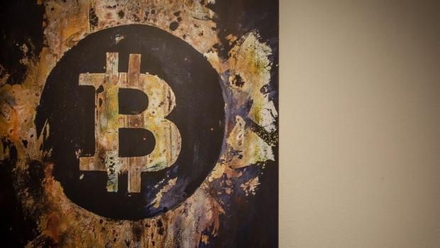 Artwork of the Bitcoin logo inside a cryptocurrency exchange in Barcelona.