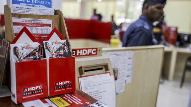 Information leaflets are displayed at a Housing Development Finance Corp. (HDFC) bank branch in Mumbai, India, on Monday, June 3, 2019. The Reserve Bank of India rate decision is scheduled for June 6. Photographer: Dhiraj Singh/Bloomberg