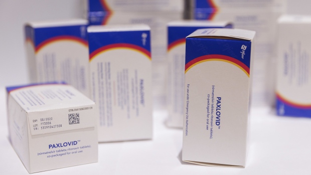 Boxes of Pfizer Inc.’s Paxlovid antiviral medication arranged in a warehouse in Shoham, Israel.