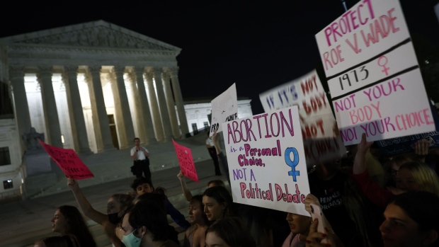 Demonstrators outside the U.S. Supreme Court in Washington, D.C., U.S., on Monday, May 2, 2022. The U.S. Supreme Court is poised to overturn the landmark Roe v. Wade decision protecting the constitutional right to abortion, according to a draft majority opinion circulated inside the court, Politico reporter.
