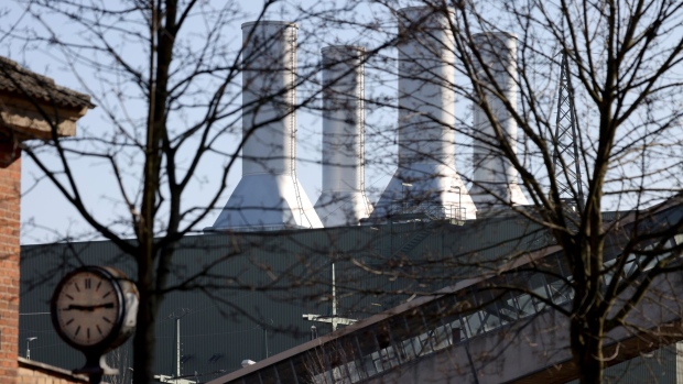 The Kirchmoeser natural gas power plant, operated by Uniper SE, beyond TKTKTK buildings in Brandenburg, Germany, on Thursday, March 24, 2022. Germany's ruling coalition reached a deal on a second package of measures to ease the burden on consumers and businesses from soaring energy costs.