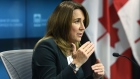 Carolyn Rogers speaks at a news conference in Ottawa on April 13, 2022.