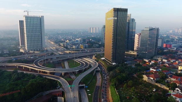 Vehicles travel along a highway in this aerial photograph taken in the Antasari area of Jakarta, Indonesia, on Friday, Feb. 1, 2019. Indonesia is scheduled to release fourth-quarter gross domestic product (GDP) figures on Feb. 6. Photographer: Dimas Ardian/Bloomberg