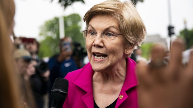 Senator Elizabeth Warren, a Democrat from Massachusetts, speaks to members of the media during a protest outside the U.S. Supreme Court in Washington, D.C., U.S., on Tuesday, May 3, 2022. Abortion rights suddenly emerged as an issue that could reshape the battle between Democrats and Republicans for control of Congress, following a report that conservatives on the U.S. Supreme Court were poised to strike down the half-century-old Roe v. Wade precedent.