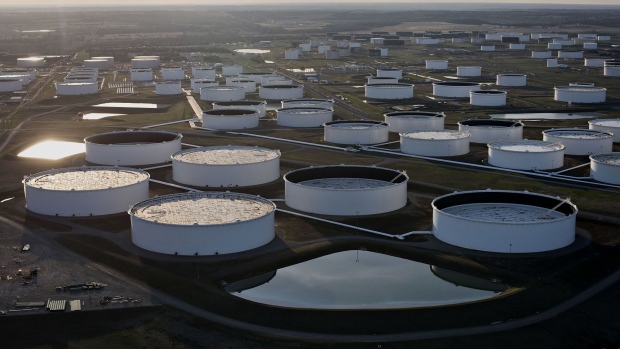 Oil storage tanks stand in this aerial photograph taken above Cushing, Oklahoma. Photographer: Daniel Acker/Bloomberg
