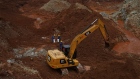 An excavator in a pit at a nickel mine operated by PT Teknik Alum Service in Morowali Regency, Central Sulawesi, Indonesia, on Thursday, March 17, 2022. Indonesia, the world’s top nickel producer, will raise production capacity of the metal after prices soared past $100,000 a ton, while the coal market is unlikely to get similar relief.