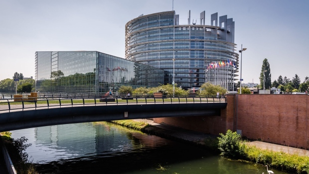 The Louise Weiss building, principle seat of the European Parliament, stands on a tributary of the River Rhine in Strasbourg, France, on Tuesday, July 16, 2019. Ursula von der Leyen of Germany made a final pitch to become European Commission president, telling lawmakers at the EU Parliament she would pursue policies to protect the climate and improve social justice. Photographer: Geert Vanden Wijngaert/Bloomberg