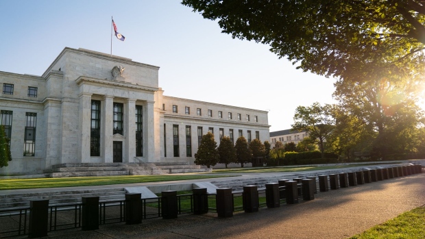 The Marriner S. Eccles Federal Reserve building stands in Washington, D.C., U.S., on Tuesday, Aug. 18, 2020. In addition to helping rescue the U.S. economy amid the coronavirus pandemic, Fed Chair Jerome Powell and colleagues also spent 2020 finishing up the central bank’s first-ever review of how it pursues the goals of maximum employment and price stability set for it by Congress. Photographer: Erin Scott/Bloomberg