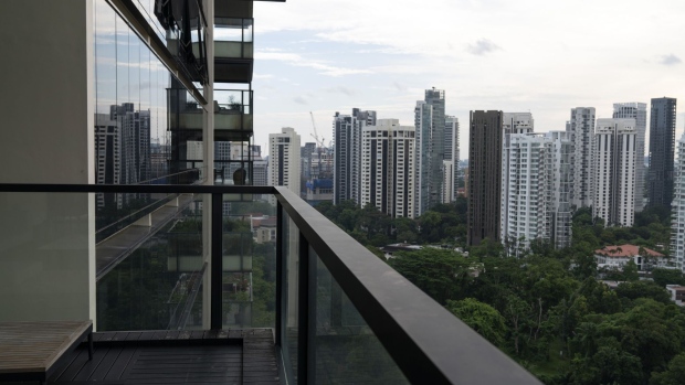 A view of condominiums near Orchard Road from an apartment for sale at the Reignwood Hamilton Scotts luxury apartment building on Scotts Road in Singapore, on Thursday, Aug. 5, 2021. The apartment listed on the market with Singapore Realtors Inc. is in a neighborhood that's walking distance from the famous Orchard Road shopping district in Singapore, where home prices jumped by a record 4.1% in the first half as tycoons across Asia seek a safe harbor.