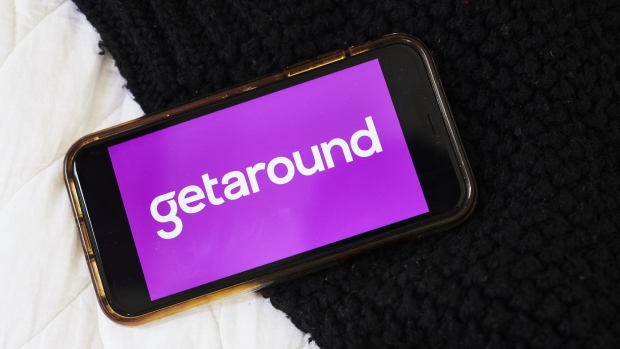 The logo for Getaround Inc. is displayed on a smartphone in an arranged photograph taken in the Brooklyn borough of New York, U.S., on Wednesday, June 10, 2020. Car-sharing platforms, which have suffered during the Covid-19 lockdown, see an opportunity emerging: an increase in short-distance, local trips as U.S. consumers look for a different way of getting to work and running errands. Photographer: Gabby Jones/Bloomberg
