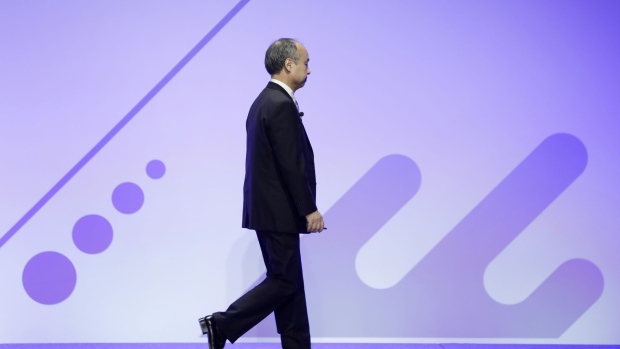 Masayoshi Son, chairman and chief executive officer of SoftBank Group Corp., leaves after he delivered a keynote speech at the Junior Chamber International (JCI) World Congress in Yokohama, Japan, on Wednesday, Nov. 4, 2020. Nvidia Corp. Chief Executive Officer Jensen Huang argued on Oct. 29 that the company’s proposed acquisition of chip designer Arm Ltd., owned by SoftBank, will benefit technological development, a pitch to industry customers and regulators that need to approve the record transaction.
