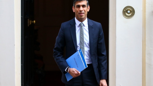 Rishi Sunak, U.K. chancellor of the exchequer, departs on his way to present the spring statement to Parliament in London, U.K., on Wednesday, March 23, 2022. Sunak is due to give his spring statement amid pressure from his own MPs to announce new support to help Britons through a growing cost-of-living crisis.
