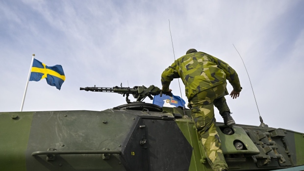 A soldier on a armed vehicle at the base of the Swedish Army's Gotland Regiment near Visby, Sweden, on Friday, March 25, 2022. Sweden's armed forces are boosting preparedness in regions including the Baltic island of Gotland, citing Russia’s increased military activity in the area.