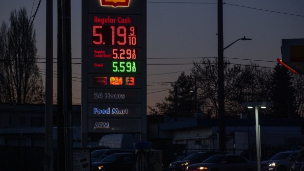 Fuel prices at a gas station in Seattle, Washington, on March 9. Photographer: Chona Kasinger/Bloomberg