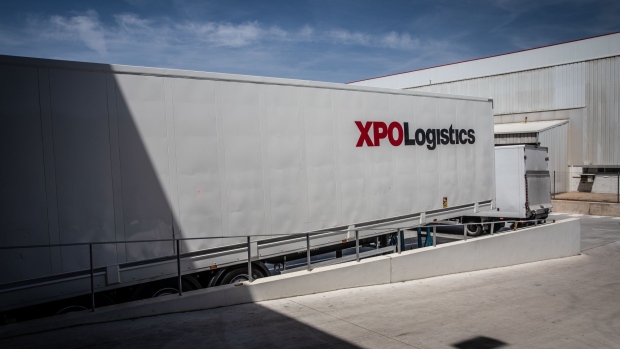 The XPO Logistics Inc. logo on a truck parked at the company's distribution hub in Barcelona, Spain, on Thursday, May 12, 2022. The freight markets will face additional volatility in the coming months from Russia's war with Ukraine, rising commodity prices and pandemic lockdowns in China. Photographer: Angel Garcia/Bloomberg