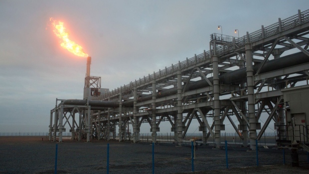 A gas flare, also known as a flare stack, burns at the Yamal LNG plant, operated by Novatek PJSC, in Sabetta, Russia, on Wednesday, Aug. 8, 2018. Novatek is one of the largest independent natural gas producers in Russia.