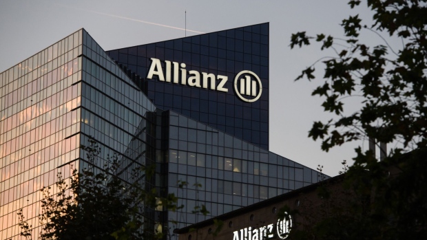 The offices of Allianz SE in the La Defense financial district of Paris, France, on Thursday, Oct. 7, 2021. France’s economic outlook improved over the summer despite a surge in cases of the delta variant, suggesting an increased vaccination rate may have ended the stop-go disruption of the pandemic.