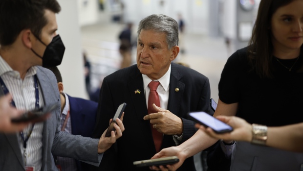 Senator Joe Manchin, a Democrat from West Virginia, speaks with members of the media at the US Capitol building in Washington, D.C., US, on Wednesday, May 11, 2022. Senators are expected to vote on a measure codify abortion access that was introduced after a leaked Supreme Court draft opinion in a case concerning a Mississippi ban on abortion after 15 weeks showed the court could overturn Roe v. Wade.