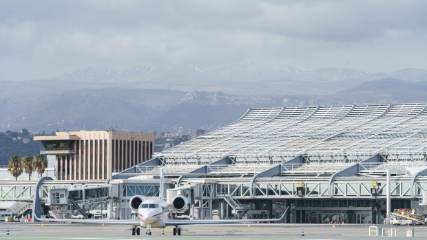 A private jet aircraft on the tarmac in front of the terminal at Nice Cote d'Azur Airport in Nice, France, on Friday, Feb. 5, 2021. In France, the government imposed tighter rules on travel in a bid to avoid a third national lockdown. Photographer: Jeremy Suyker/Bloomberg