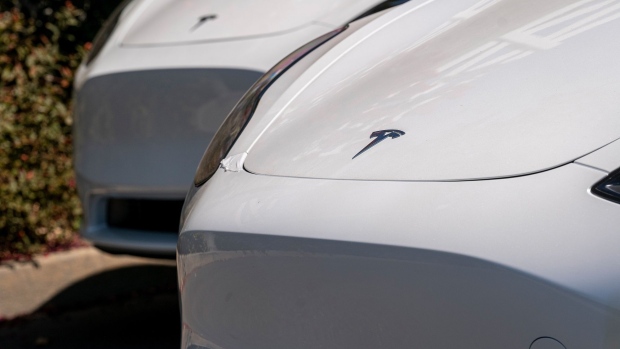 Tesla Model 3 vehicles at a store in Rocklin, California, U.S., on Wednesday, July 21, 2021. Tesla Inc. is scheduled to release earnings figures on July 26. Photographer: David Paul Morris/Bloomberg