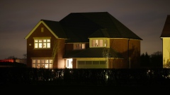 KNUTSFORD, UNITED KINGDOM - FEBRUARY 03: Recently constructed show homes are illuminated for potential buyers on a new housing estate on February 03, 2022 in Knutsford, United Kingdom. The energy regulator OFGEM has brought forward the announcement of the increase in the energy price cap to reflect the record high gas energy market prices caused by the global crisis in supply. (Photo by Christopher Furlong/Getty Images)