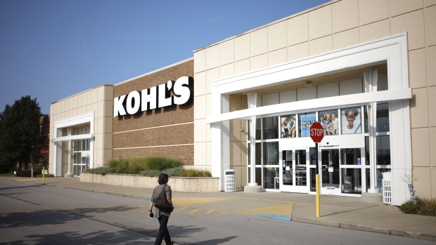 An employee walks towards the front entrance of a Kohl's Corp. department store in Lexington, Kentucky, U.S., on Wednesday, Aug. 11, 2021. Kohl's Corp. is expected to release earnings figures on Aug. 19. Photographer: Luke Sharrett/Bloomberg