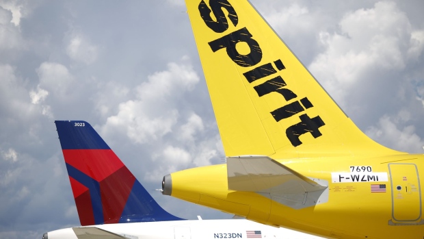 Airbus SE A321 planes with a livery for Delta Air Lines Inc., left, and Spirit Airlines Inc. are seen at the Airbus Final Assembly Line facility in Mobile, Alabama, U.S., on Wednesday, July 19, 2017. The U.S. Census Bureau is scheduled to release durable goods figures on August 3. Photographer: Luke Sharrett/Bloomberg