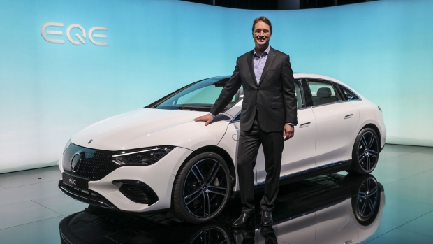 Ola Kallenius, chief executive officer of Daimler AG, unveils the Mercedes-Benz AG EQE electric vehicle (EV) during an event ahead of the IAA Munich Motor Show in Munich, Germany, on Sunday, Sept. 5, 2021. The IAA, taking place in Munich for the first time, is the first in-person major European car show since the Coronavirus pandemic started.