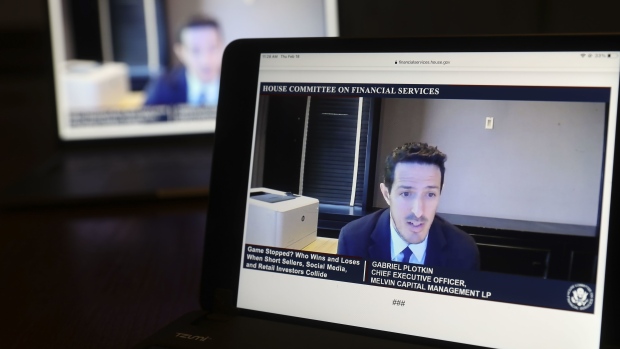 Gabe Plotkin, chief executive officer and founder of Melvin Capital Management LP, speaks virtually during a House Financial Services Committee hearing on a laptop computer in Tiskilwa, Illinois, U.S., on Thursday, Feb. 18, 2021. Robinhood Markets and Citadel, central players in the GameStop Corp. saga that riveted markets last month plan to deliver a unified message to U.S. lawmakers that conspiracies swirling in Washington, that they worked together to harm retail investors are categorically false.