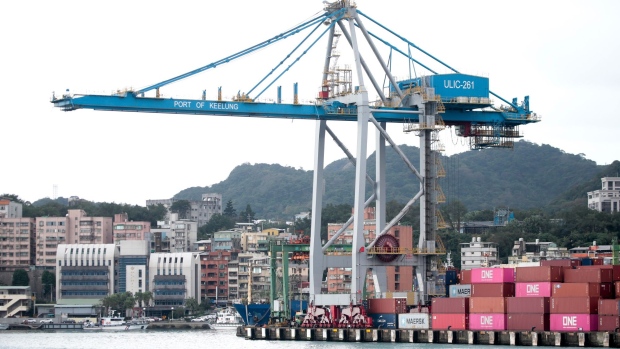 A gantry crane at the Port of Keelung in Keelung, Taiwan, on Friday, Jan. 7, 2022. Taiwan exports extended their double-digit growth for a tenth month, with shipments from the island in 2021 smashing all records due to soaring demand for technology products and components.