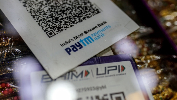 A bangle store advertises the use of the Paytm digital payment system in Mumbai, India, on Saturday, July 17, 2021. Paytm, the Indian digital payments pioneer backed by SoftBank Group Corp., is seeking approval for a $2.2 billion initial public offering that could be India's largest.
