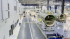 The fuselage of an Airbus A220 at the Airbus Canada LP pre-assembly plant in Mirabel, Quebec, Canada, on Thursday, April 14, 2022. Airbus has added 125,000 square feet of additional space in Mirabel, designed to support the A220 production ramp up capacity, which is expected to more than double in the next few years.