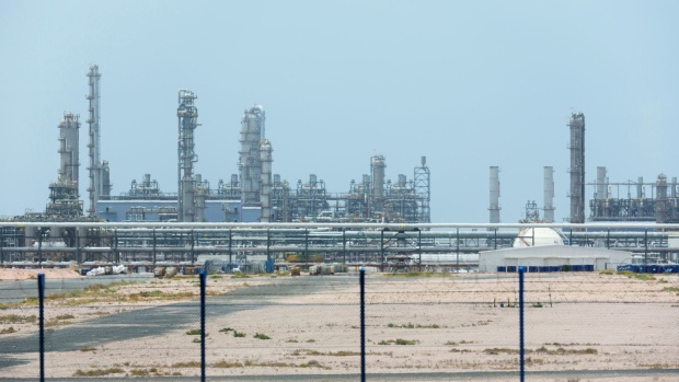 Cracking towers stand at the Borouge 3 petrochemical plant within the Ruwais refinery and petrochemical complex, operated by Abu Dhabi National Oil Co. (ADNOC), in Al Ruwais, United Arab Emirates, on Monday, May 14, 2018. Adnoc is seeking to create world’s largest integrated refinery and petrochemical complex at Ruwais.