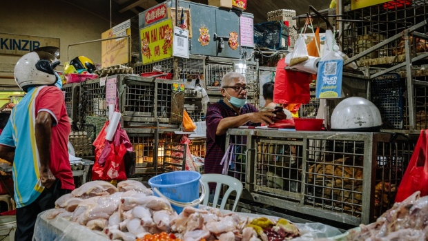 A poultry stall at a market in Kuala Lumpur, Malaysia, on Wednesday, Feb. 9, 2022. Malaysia’s economy likely emerged from recession with a 5.6% year-on-year rebound in 4Q, following a contraction of 4.5% in the previous quarter, according to Bloomberg Economics’ estimates.