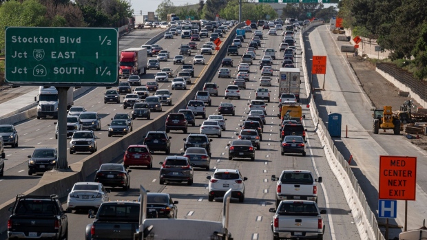 Traffic on Highway 50 in Sacramento, California, U.S., on Thursday, March 24, 2022. California Governor Gavin Newsom is proposing to send car owners $400 debit cards and partially pause gasoline taxes to address high gas prices.