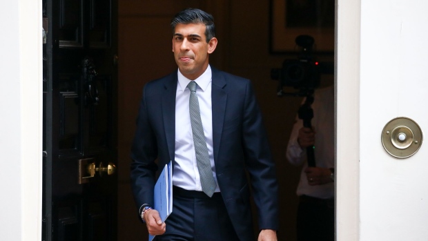 Rishi Sunak, U.K. chancellor of the exchequer, departs on his way to present the spring statement to Parliament in London, U.K., on Wednesday, March 23, 2022. Sunak is due to give his spring statement amid pressure from his own MPs to announce new support to help Britons through a growing cost-of-living crisis.